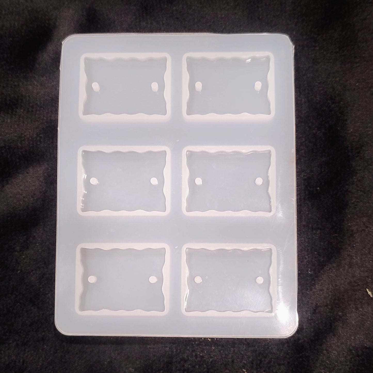 rakhi mould
6 Cavity Rectangle Agate Rakhi Mould For Resin Art
silicon mould for rakhi