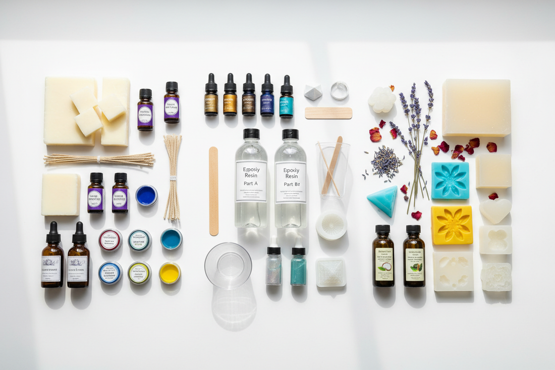 "A professional display of crafting essentials including high-quality candle making material, clear resin art material, and specialized soap making material arranged with silicone candle moulds on a white workspace."