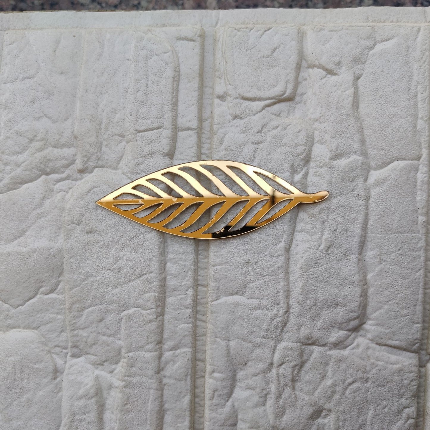 Golden acrylic leaf