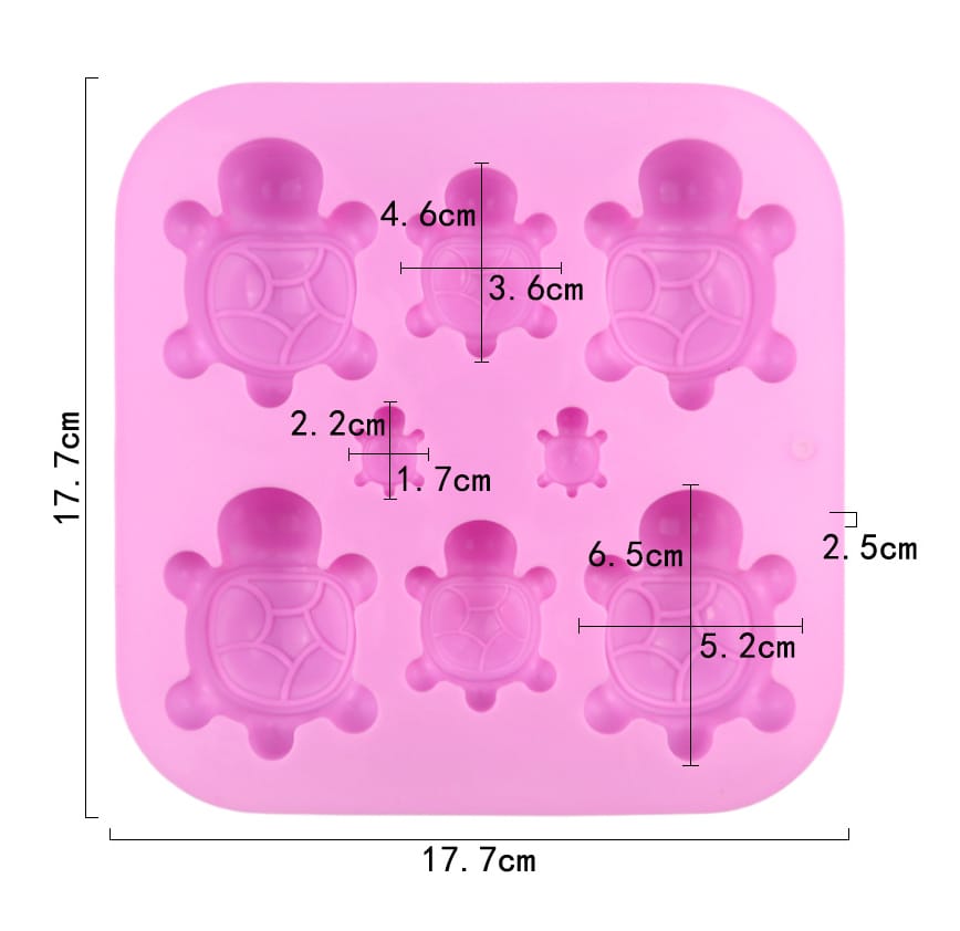 Silicone mold with turtle shapes and measurements on a white background