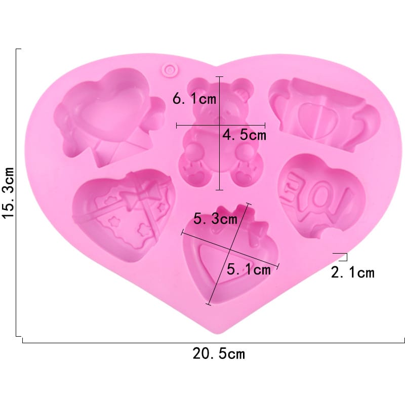 Heart-shaped silicone mold with various shapes and measurements on a white background