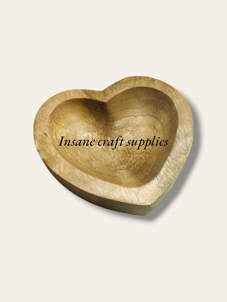 heart-shaped candle bowl 
wooden candle base